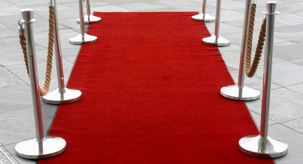 In modern public spaces, managing crowds safely and efficiently has become more important than ever. From airports and shopping malls to banks, hotels, events, and corporate offices, businesses need reliable systems that help organize people while maintaining a professional appearance. One of the most effective tools used for this purpose is steel stanchions. Known for their durability, sleek design, and versatility, steel stanchions have become a preferred choice for crowd control and queue management across multiple industries. Queue Tech specializes in providing high-quality steel stanchions designed to meet the demands of commercial environments. Whether it is guiding customers in retail stores or controlling large crowds at public events, steel stanchions offer a practical and long-lasting solution. What Are Steel Stanchions? Steel stanchions are upright posts used to create organized pathways, barriers, or queue lines. They are commonly connected using retractable belts, ropes, or chains to guide people in an orderly manner. Steel is widely used for stanchions because of its strength, corrosion resistance, and premium appearance. These stanchions are available in various styles, including retractable belt stanchions, rope stanchions, and decorative barrier systems. Their flexibility makes them suitable for both indoor and outdoor applications. Importance of Steel Stanchions in Crowd Control Crowd management is essential in places where large numbers of people gather. Without proper organization, crowds can quickly become chaotic, leading to confusion, delays, and safety risks. Steel stanchions help create structured pathways that improve movement and reduce congestion. Businesses and organizations use steel stanchions to: Maintain organized queues Improve customer experience Enhance safety and security Protect restricted areas Guide visitors efficiently Reduce confusion during busy hours By clearly defining walking paths and waiting areas, steel stanchions contribute to a more professional and controlled environment. Key Features of Steel Stanchions Durability Steel stanchions are built to withstand heavy daily use. Unlike plastic alternatives, steel provides excellent strength and long-term performance. High-quality stainless steel stanchions resist scratches, dents, and corrosion, making them suitable for demanding environments. Professional Appearance One of the major advantages of steel stanchions is their elegant and polished look. Their modern appearance enhances the overall image of businesses and public spaces. Chrome, brushed stainless steel, and powder-coated finishes add sophistication to any environment. Versatility Steel stanchions can be used in a wide variety of settings. They are available in different heights, belt colors, rope materials, and base styles to match specific business requirements. Easy Setup and Mobility Most steel stanchions are designed for quick installation and repositioning. This flexibility allows businesses to adjust queue layouts based on crowd size or event requirements. Safety and Stability Heavy-duty steel bases provide excellent stability, preventing accidental tipping. Many models also include non-slip rubber bottoms to protect flooring surfaces and enhance safety. Types of Steel Stanchions Retractable Belt Stanchions Retractable belt stanchions are among the most popular crowd control systems. They feature an extendable belt that locks securely into another post. These systems are commonly used in airports, banks, retail stores, and ticket counters. Advantages include: Quick setup Adjustable queue lengths Space-saving design Easy storage Multiple belt color options Rope Steel Stanchions Rope stanchions offer a more elegant and luxurious appearance. They are often used in hotels, theaters, VIP events, museums, and red carpet events. Velvet or braided ropes combined with polished steel posts create a premium atmosphere. Chain Barrier Stanchions Chain stanchions are frequently used in warehouses, parking areas, factories, and outdoor spaces. They provide a simple and effective way to restrict access or guide pedestrian traffic. Applications of Steel Stanchions Airports and Transportation Hubs Airports experience large passenger volumes daily, making organized queue management essential. Steel stanchions help direct travelers through check-in counters, security checkpoints, and boarding gates efficiently. Retail Stores Retail businesses use steel stanchions to manage checkout lines, promotional events, and customer flow during peak shopping seasons. Organized queues improve the shopping experience and reduce frustration. Hotels and Hospitality Luxury hotels often use rope steel stanchions to create elegant waiting areas and VIP sections. These stanchions enhance the professional appearance of entrances and reception areas. Banks and Financial Institutions Banks require efficient queue management systems to maintain order and improve customer service. Steel stanchions help organize customers while ensuring privacy and security. Events and Entertainment Venues Concerts, exhibitions, sports arenas, and conferences rely heavily on steel stanchions for crowd control. They help manage entrances, ticket lines, and restricted access zones. Healthcare Facilities Hospitals and clinics use steel stanchions to direct patients, manage waiting areas, and maintain organized movement within medical facilities. Benefits of Using Steel Stanchions Improved Customer Experience Customers appreciate organized and clearly defined waiting areas. Steel stanchions reduce confusion and create smoother traffic flow, leading to a more positive experience. Enhanced Safety Crowded spaces can become hazardous without proper management. Steel stanchions help prevent overcrowding and maintain safe distances between individuals. Cost-Effective Solution Because of their durability and low maintenance requirements, steel stanchions provide excellent long-term value. Businesses can use them for years without frequent replacement. Brand Image Enhancement A clean and organized environment reflects professionalism. Stylish steel stanchions contribute to a positive brand image and create a welcoming atmosphere for customers. Flexible Space Management Steel stanchions allow businesses to modify layouts quickly according to changing crowd sizes or event needs. This adaptability makes them highly practical. Choosing the Right Steel Stanchions Consider the Environment Indoor and outdoor environments may require different materials and finishes. Stainless steel stanchions are ideal for outdoor use because they resist rust and weather damage. Evaluate Traffic Volume High-traffic areas need heavy-duty stanchions with stable bases and durable belts or ropes. Select the Appropriate Style Businesses should choose stanchions that complement their environment. Retractable belts work well in functional spaces, while rope stanchions suit luxury settings. Focus on Safety Features Non-slip bases, locking belt systems, and stable construction are important safety considerations. Customization Options Many businesses prefer customized stanchions with branded belt colors or logos to strengthen brand identity. Maintenance Tips for Steel Stanchions Regular Cleaning Cleaning steel stanchions regularly helps maintain their appearance. Stainless steel cleaners and microfiber cloths can remove fingerprints and dust effectively. Inspect Belts and Connections Retractable belts and connectors should be checked periodically for wear or damage to ensure smooth operation. Proper Storage When not in use, stanchions should be stored carefully to avoid scratches and unnecessary damage. Check Base Stability Loose or damaged bases should be repaired immediately to prevent accidents. Why Businesses Prefer Steel Over Other Materials Steel offers several advantages over plastic or aluminum alternatives. It provides superior strength, better aesthetics, and longer lifespan. Businesses that prioritize durability and professional presentation often choose steel stanchions for their crowd management systems. Steel stanchions also require less frequent replacement, making them a more sustainable and economical option over time. Future Trends in Steel Stanchions As businesses continue to improve customer experience and operational efficiency, steel stanchions are evolving with modern features. Innovations include: Smart queue management integration Digital signage attachments Custom branding options Antimicrobial coatings Eco-friendly manufacturing materials These advancements are making steel stanchions even more valuable in commercial and public environments. Why Choose Queue Tech for Steel Stanchions Queue Tech is committed to delivering premium-quality steel stanchions that combine durability, functionality, and modern design. With a focus on customer satisfaction and innovative crowd control solutions, Queue Tech provides products suitable for various industries and applications. Whether businesses need retractable belt stanchions for retail environments or elegant rope barriers for luxury venues, Queue Tech offers dependable solutions tailored to professional requirements. Conclusion At Queue Tech, steel stanchions are an essential part of modern crowd management and space organization. Their strength, versatility, and professional appearance make them ideal for businesses and public spaces seeking efficient queue control solutions. From airports and hotels to retail stores and event venues, steel stanchions improve safety, enhance customer experience, and support organized operations. As industries continue to prioritize efficiency and presentation, the demand for high-quality steel stanchions will continue to grow. Queue Tech remains dedicated to providing reliable and stylish stanchion systems that help businesses create safer and more organized environments.